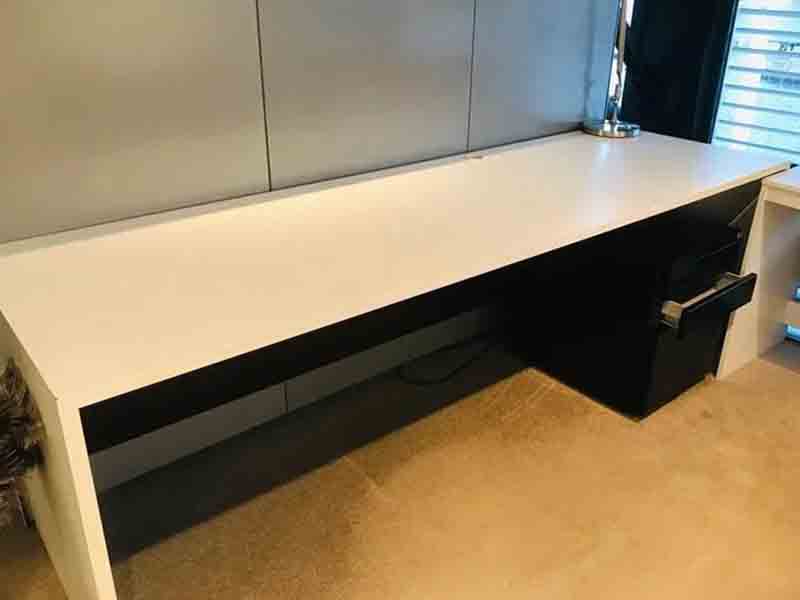 Clean white office desk and drawer